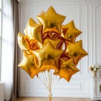 Облако из золотых фольгированных звезд